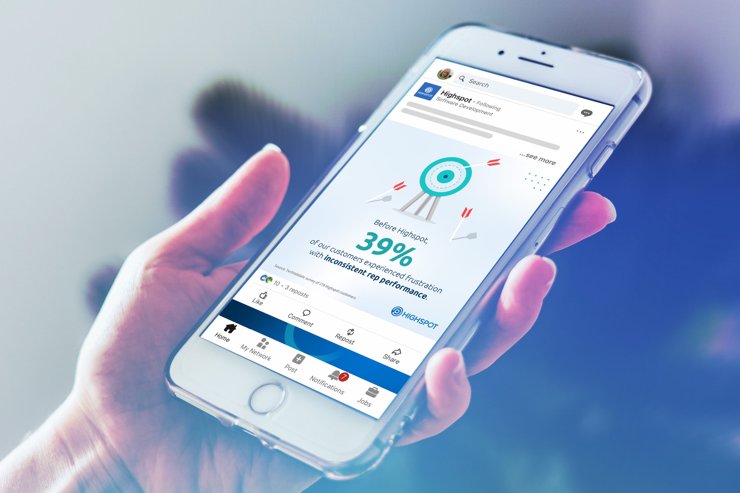 Hand holding a phone with Highspot illustration copy